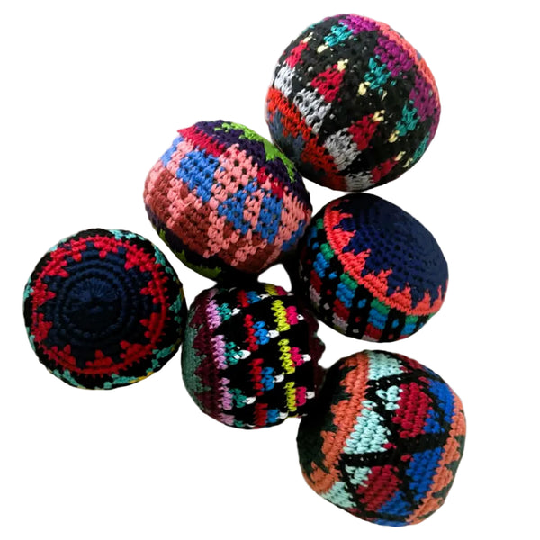 Colorful crocheted balls on a white background